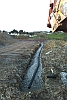 Installing 380m pipe connecting septic tank facility to soakaway on a Cornish Holiday Village